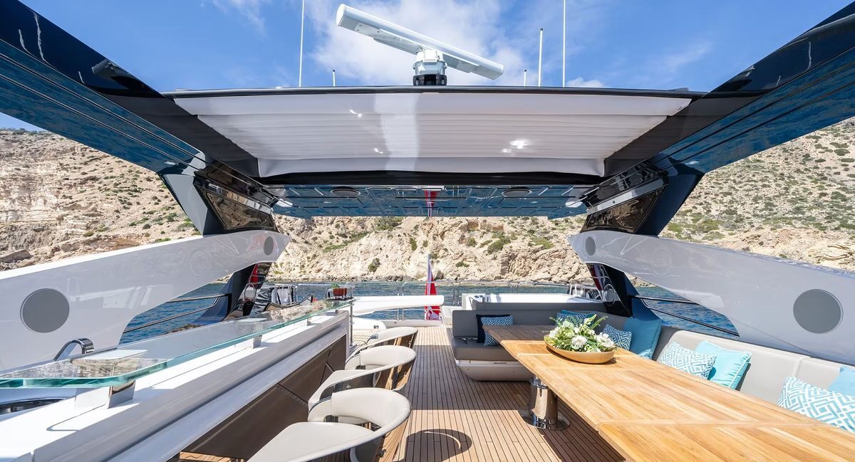 M/Y Lio Black Knight Sunseeker 95 flybridge bar and lounge — luxury yacht charter Mallorca