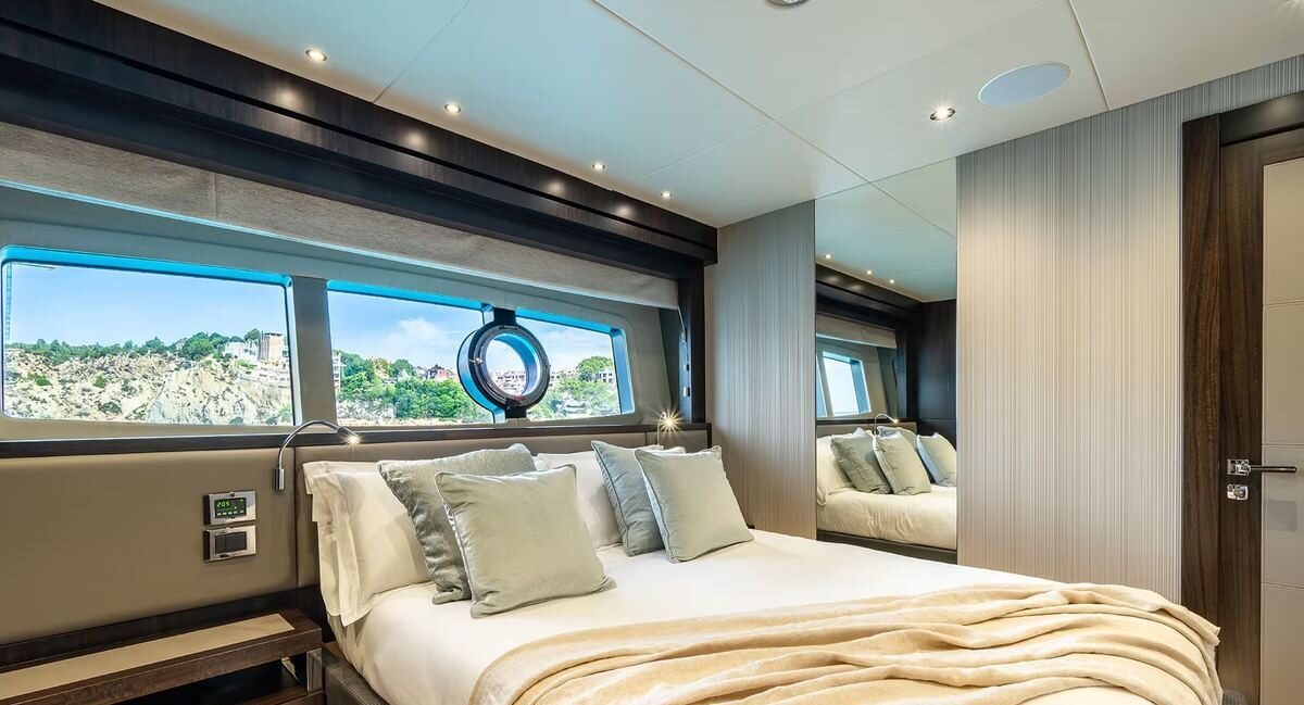 M/Y Lio Black Knight Sunseeker 95 VIP cabin suite — luxury yacht charter accommodation