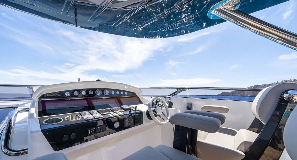Aerial view of guests dining on foredeck of M/Y Lio Black Knight Sunseeker 95 — charter Mallorca