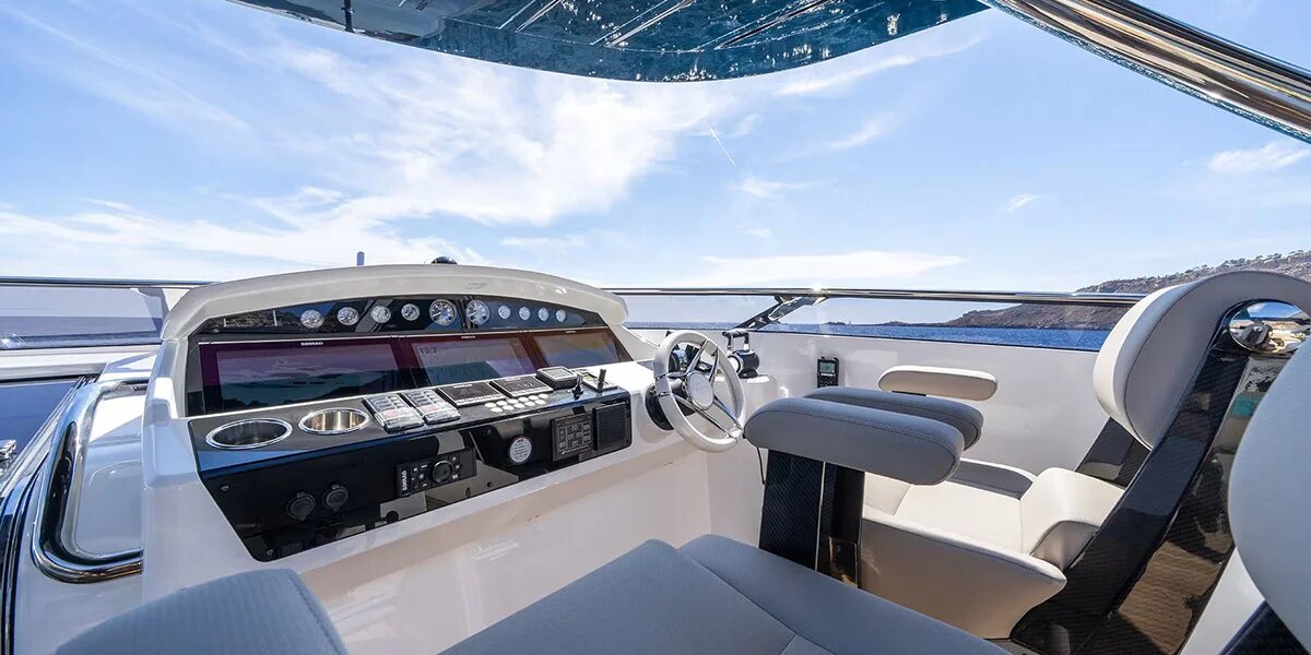 Guest riding electric hydrofoil from M/Y Lio Black Knight Sunseeker 95 — water toys charter Mallorca
