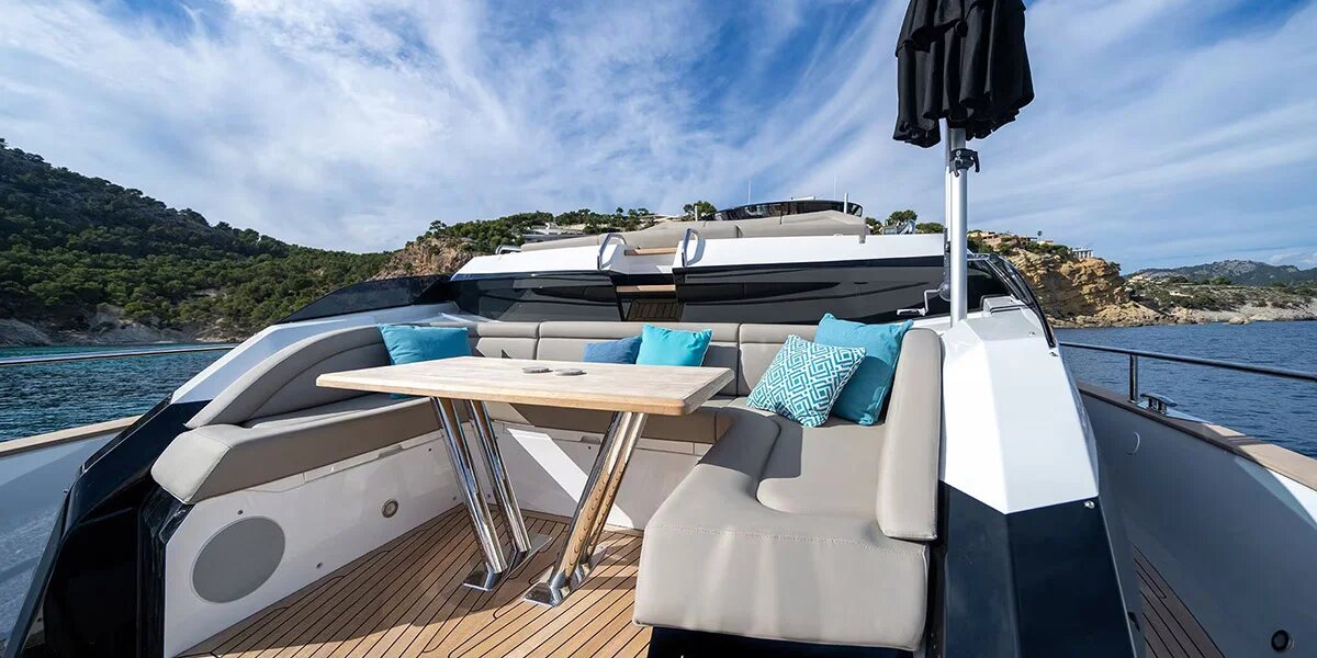 M/Y Lio Black Knight Sunseeker 95 foredeck dining area — luxury yacht charter Mallorca