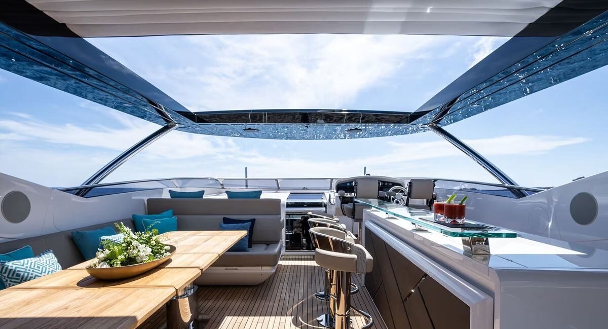M/Y Lio Black Knight Sunseeker 95 interior staircase to salon — luxury yacht charter