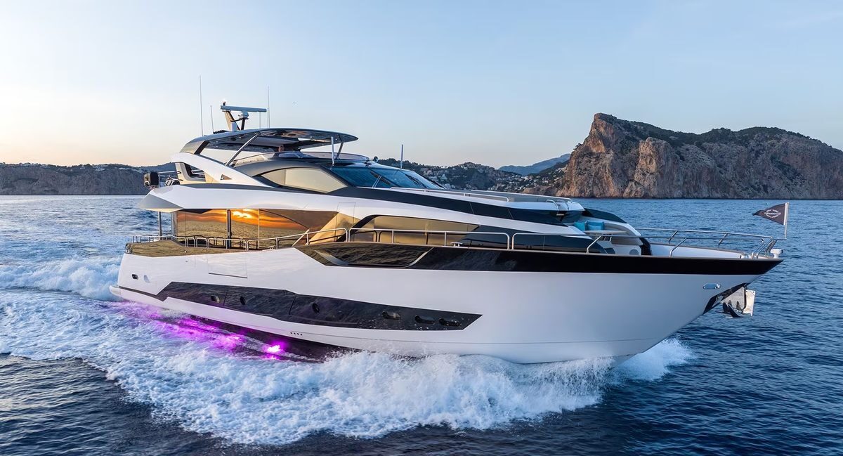 M/Y Lio Black Knight Sunseeker 95 with companion yacht at sea — luxury charter Mallorca